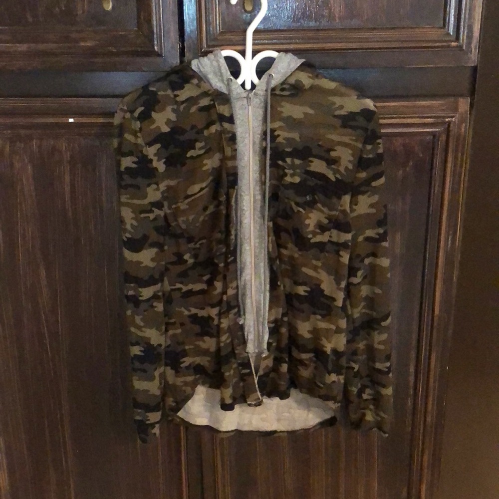 An army-colored jacket with gray